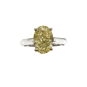 DB Classic Oval-Shaped Fancy Intense Yellow Diamond Ring_01